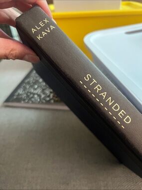 Stranded Brand Title Page - Black Text on Cream Paper